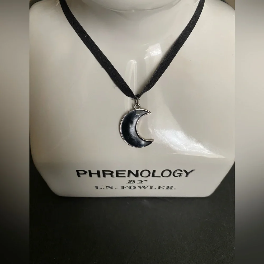 Hot Topic black crescent moon enamel charm necklace